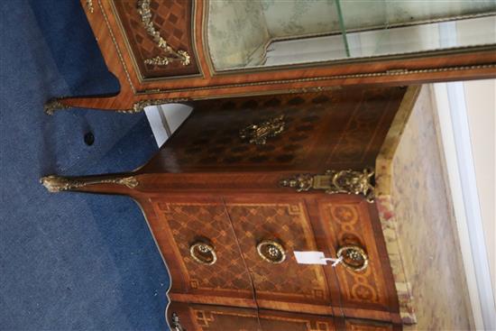 An early 20th century French Transitional style marquetry breakfront commode, W.4ft D.1ft 7.5in. H.2ft 11.5in.